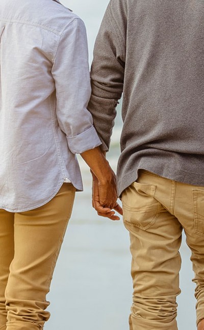 Senior couple walking on the beach